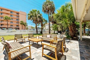 Outdoor dining - South Beach Retreat: Stylish 1-BR Beach Haven, Steps from Indian Rocks Beach! (Indian Rocks Beach)