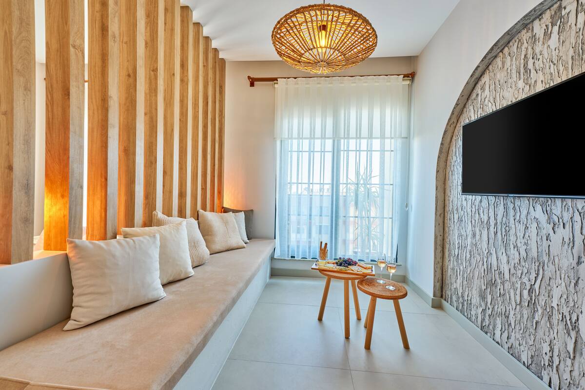 junior suite | living area | 43-inch smart tv with satellite channels, netflix, hulu