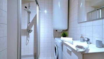 Hair dryer, towels, soap, toilet paper