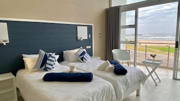 Quarto casal ou duplo luxo | Frigobar, cofres nos quartos, Wi-Fi de cortesia, roupa de cama