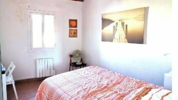 2 dormitorios, escritorio, tabla de planchar con plancha y wifi gratis