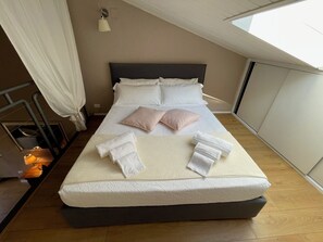 1 slaapkamer, een strijkplank/strijkijzer, wifi, beddengoed