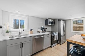 Fridge, microwave, oven, stovetop - Modern 2 Bed 1 Bath Walking Distance to Downtown (Brevard)