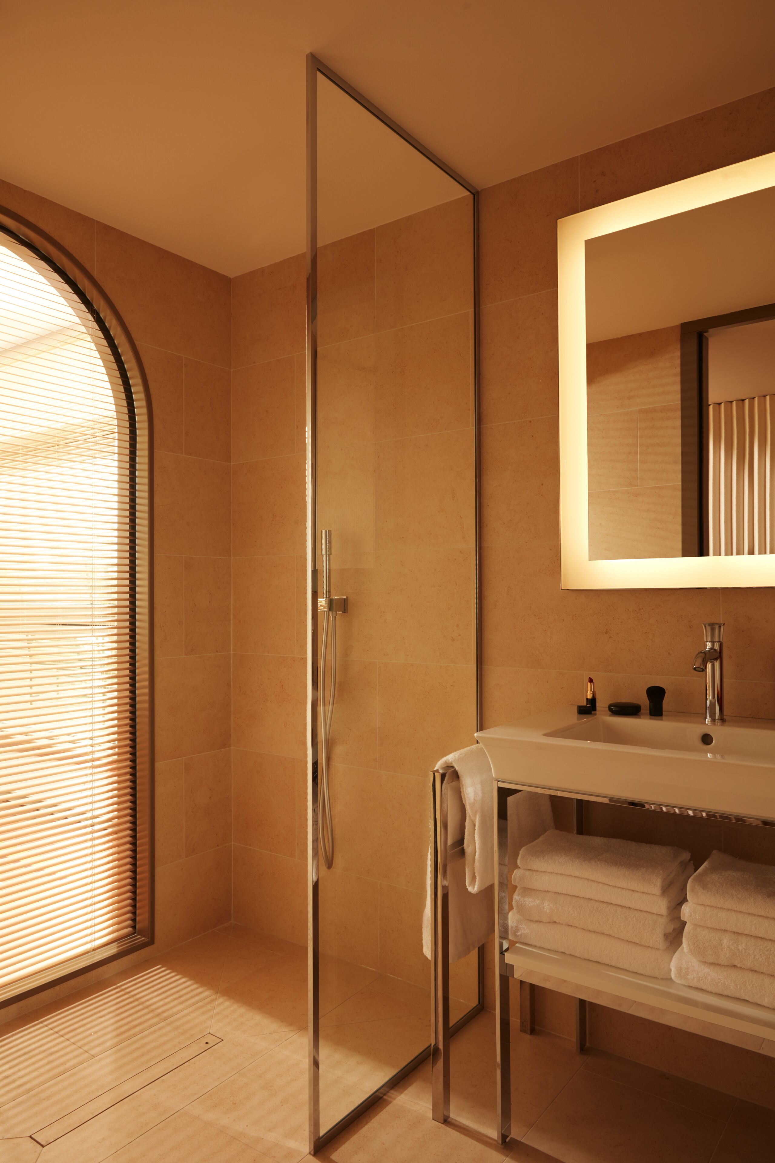 Designer toiletries, hair dryer, bathrobes, slippers