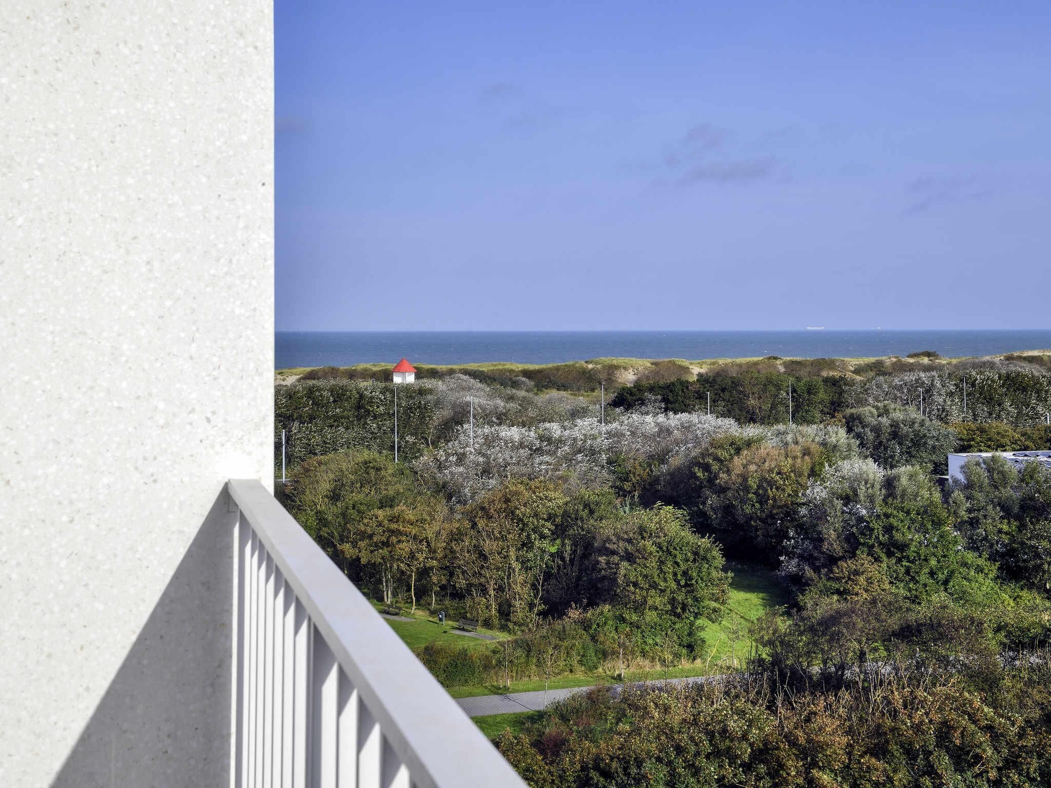 Quarto superior, 1 cama de casal, sacada, vista para o oceano | Frigobar, escrivaninha, Wi-Fi de cortesia