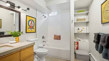 Shower, eco-friendly toiletries, hair dryer, towels