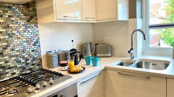 Microwave, oven, toaster, cookware/dishes/utensils