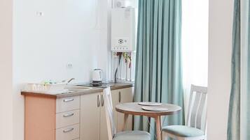 Deluxe Studio | Egyptian cotton sheets, premium bedding, desk, soundproofing