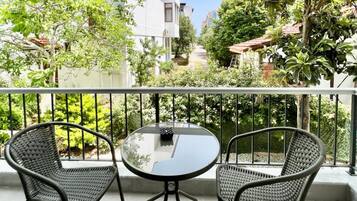 Deluxe Triple Room, 1 Bedroom | Terrace/patio
