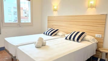 Habitación doble | Caja fuerte, wifi gratis, ropa de cama