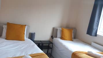 Business House | 3 bedrooms, premium bedding, individually furnished, laptop workspace