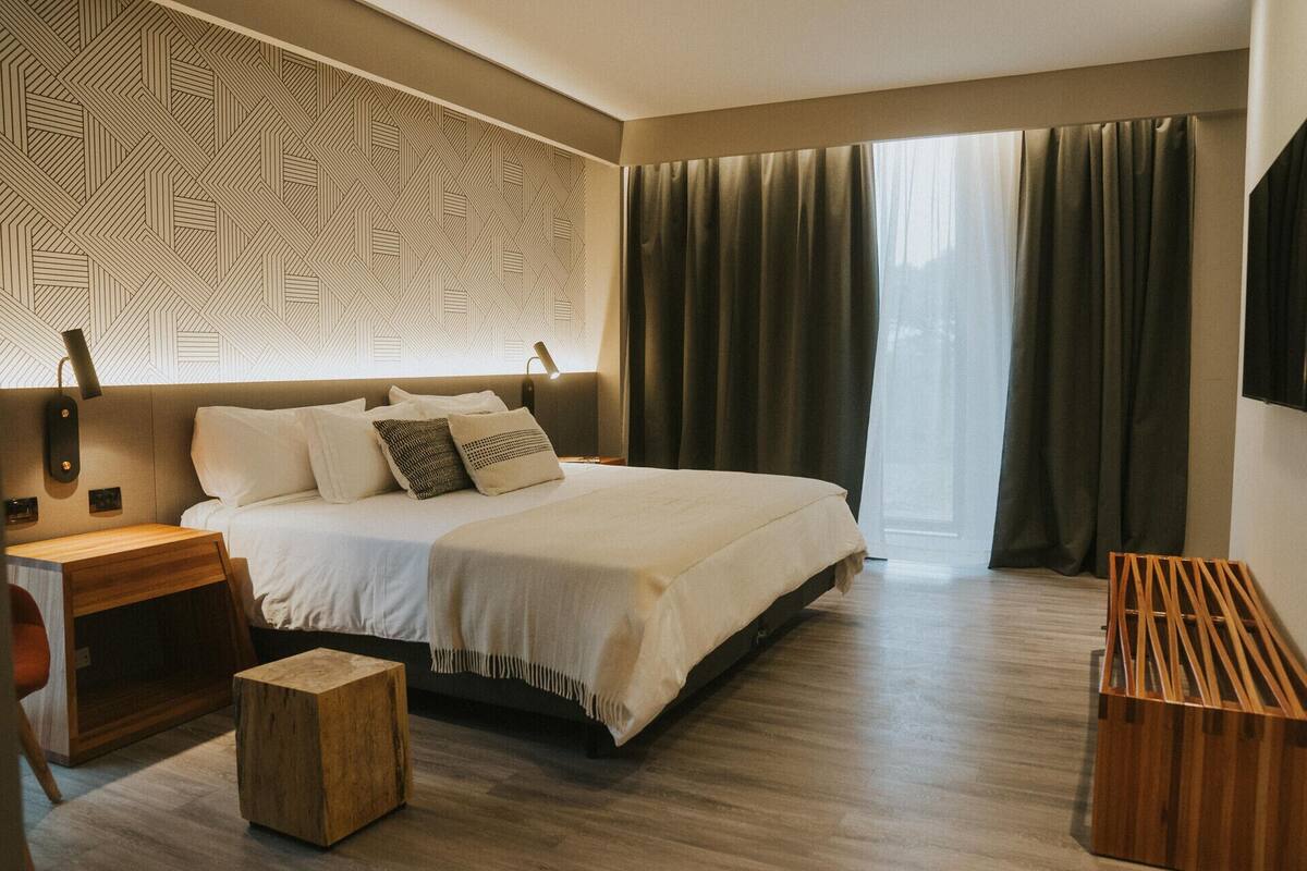 Premium bedding, down comforters, in-room safe, desk