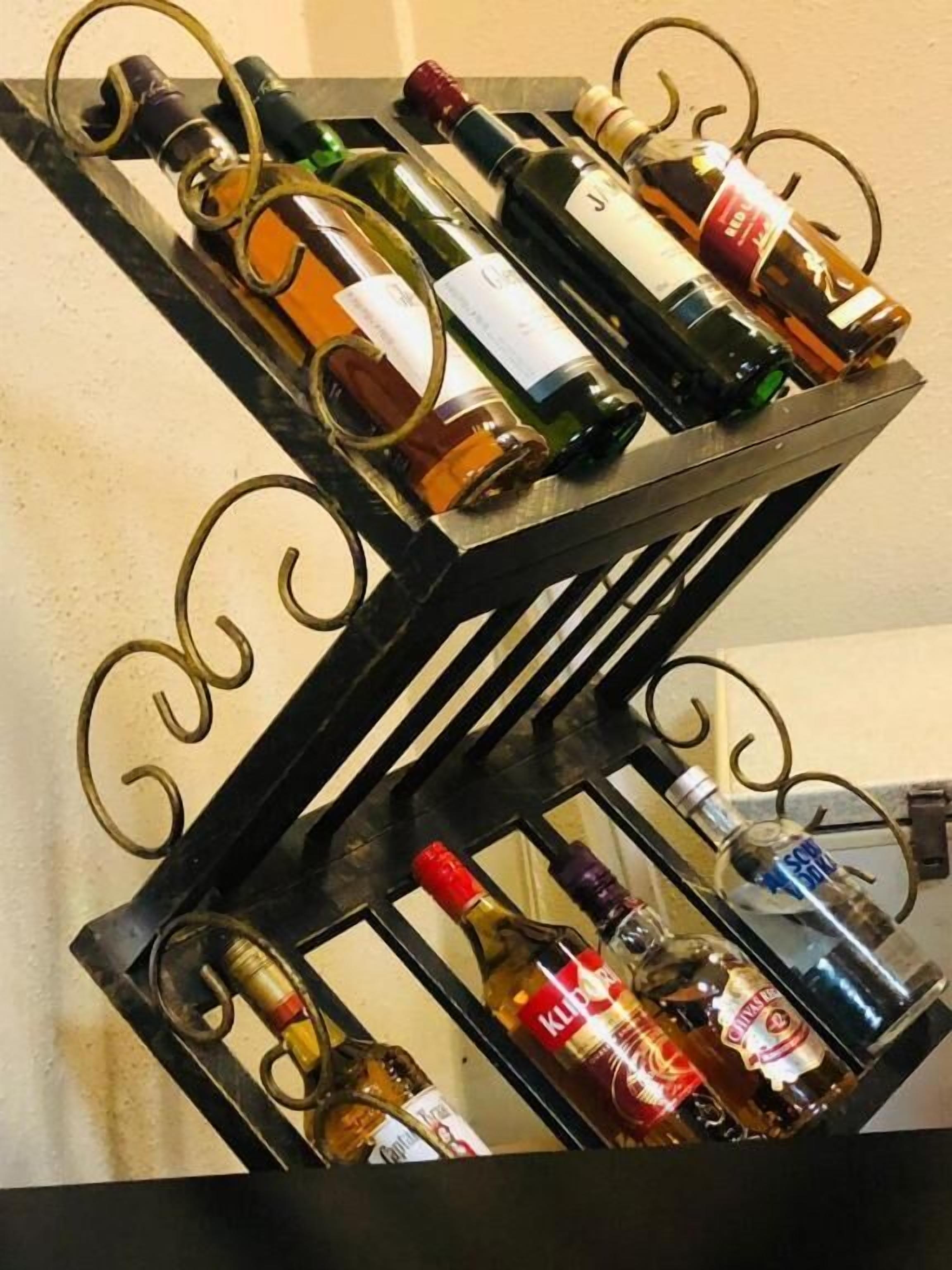 A wine rack with multiple bottles, including various types of wine and spirits.
