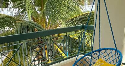Beautiful Apt with pool and steps from the beach