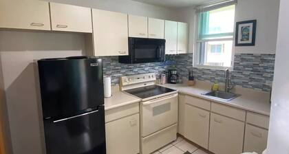 Beautiful Apt with pool and steps from the beach