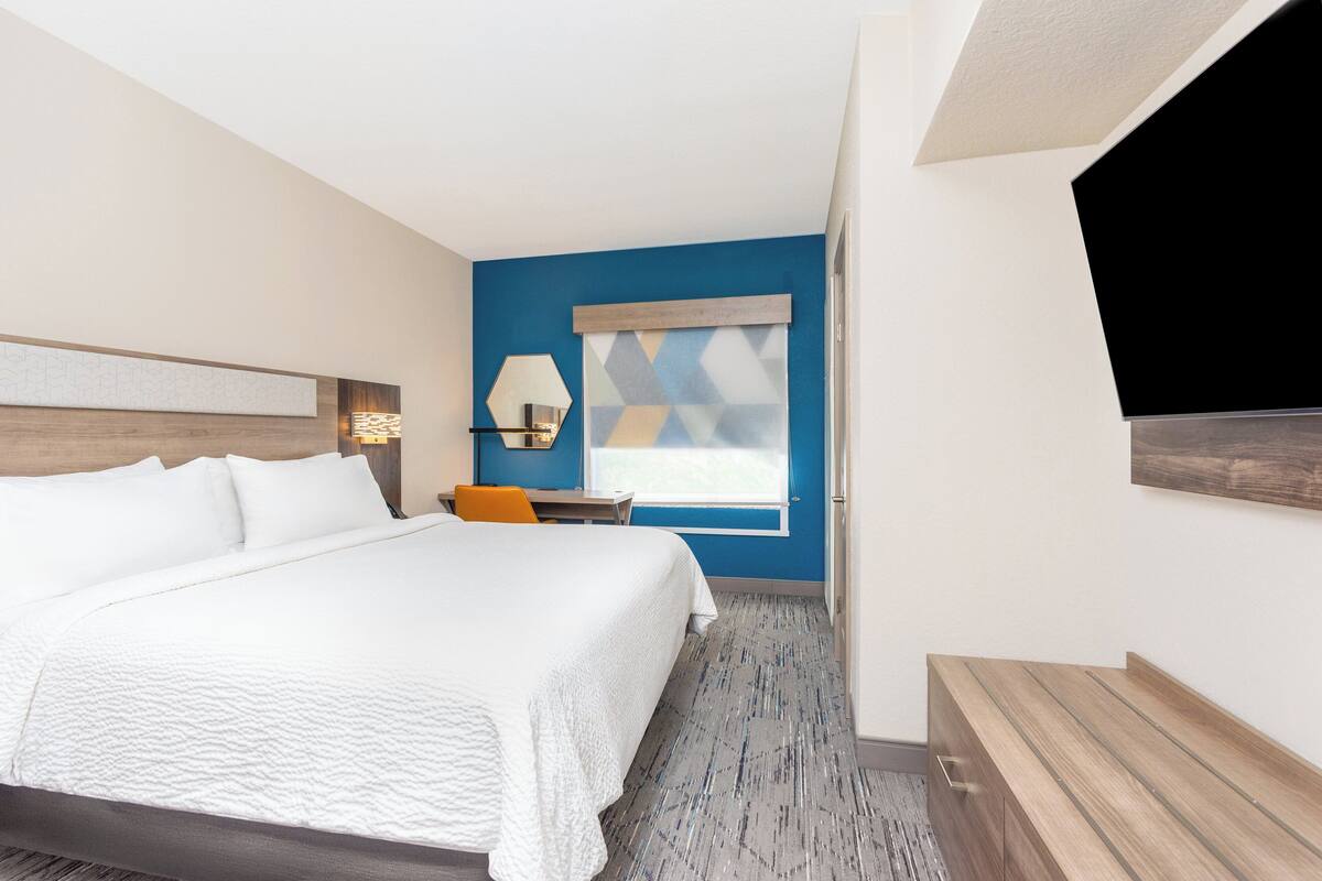 Suite, 1 habitación | Caja fuerte, escritorio, wifi gratis y ropa de cama