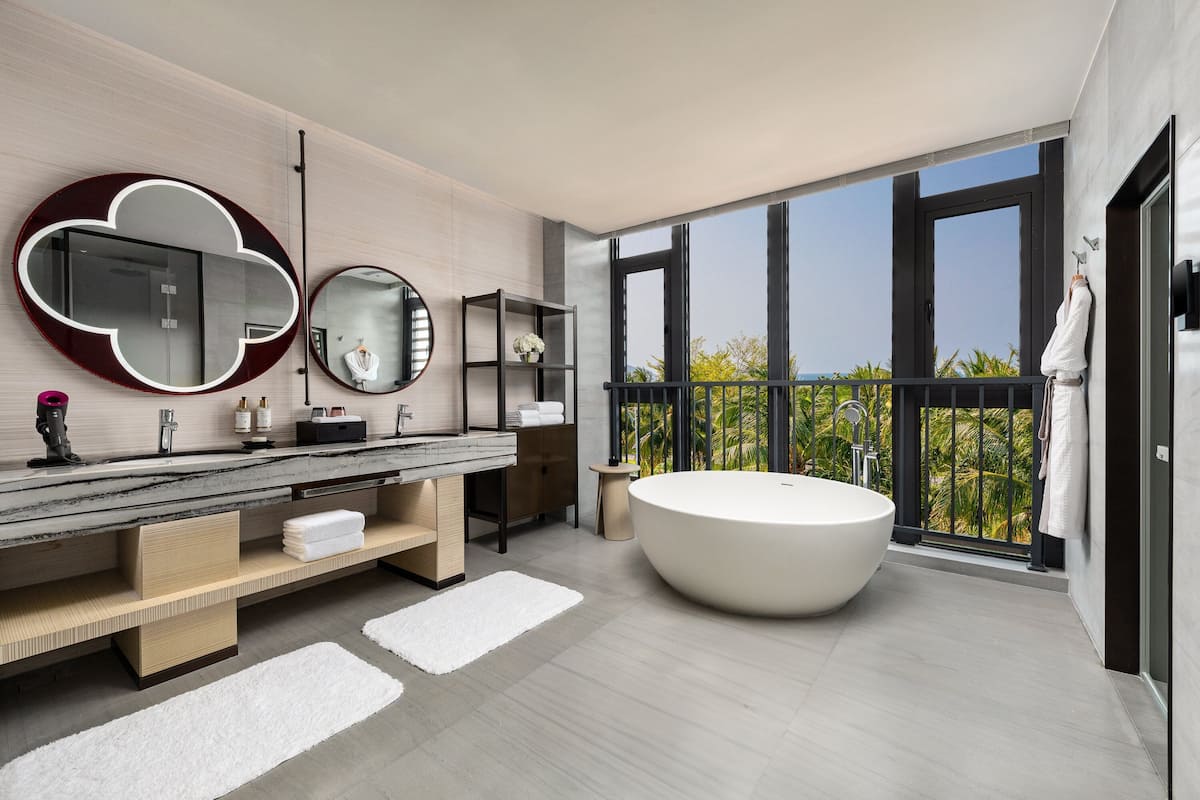 Separate bathtub and shower, hair dryer, bathrobes, slippers