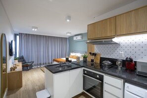 Appartement | Privékeuken | Kookgerei, borden en bestek