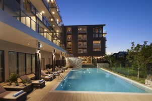 Outdoor pool, pool umbrellas, pool loungers