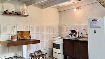 Basic Chalet | Private kitchen | Fridge, microwave, cookware/dishes/utensils