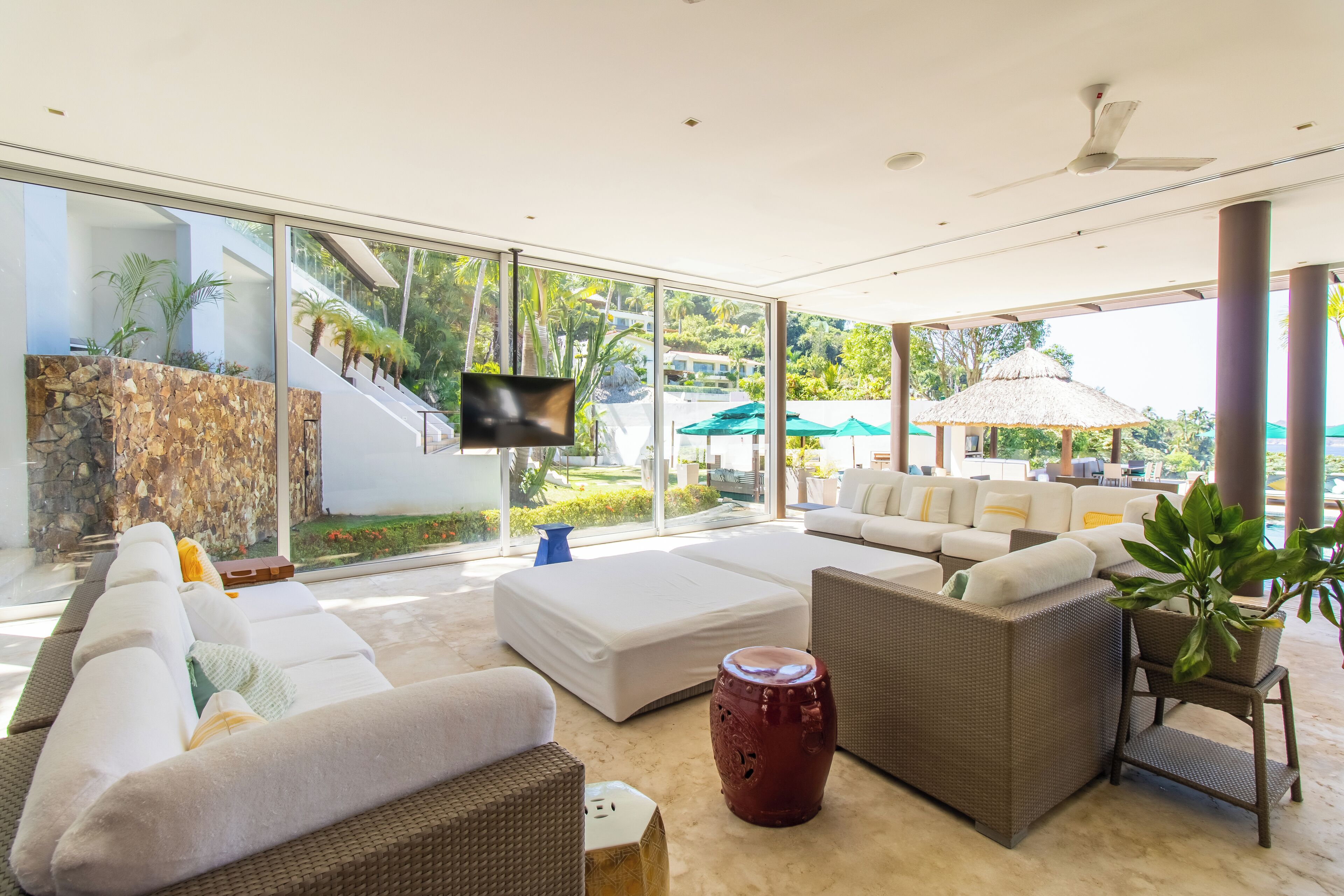 Villa | Living area | 55-inch flat-screen TV with cable channels