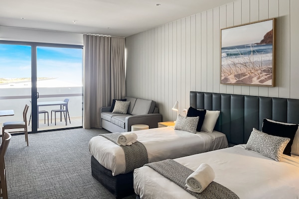 Superior King or Twin Room | Living area | Flat-screen TV