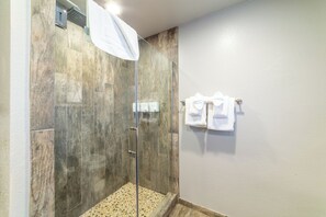 Shower, hair dryer, towels, soap