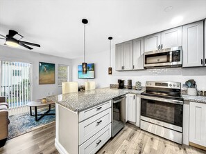 Fridge, microwave, oven, stovetop - Resort-Style Condo With Private Balcony and Pool (Clearwater)
