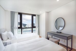 Habitación Deluxe con 2 camas individuales, varias camas | Vistas desde la habitación