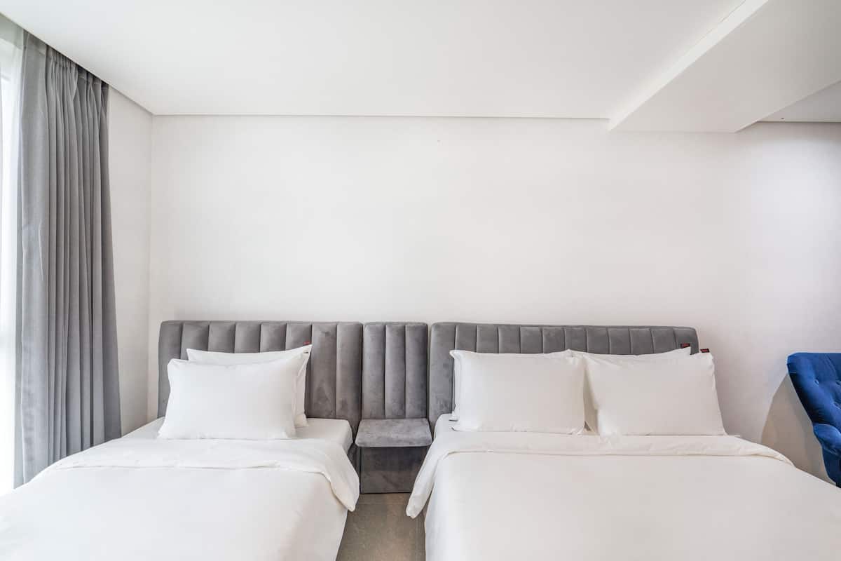 Family Double Room, Multiple Beds | 2 bedrooms, individually decorated, individually furnished, desk