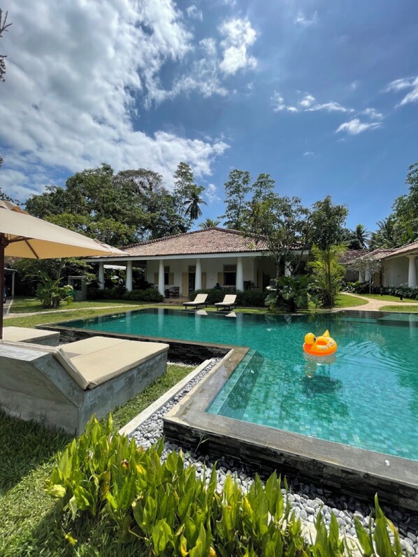 Outdoor pool, pool umbrellas, pool loungers