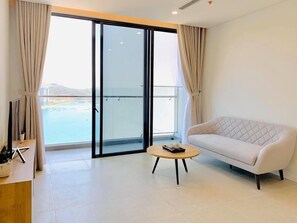Apartamento Deluxe | Zona de estar