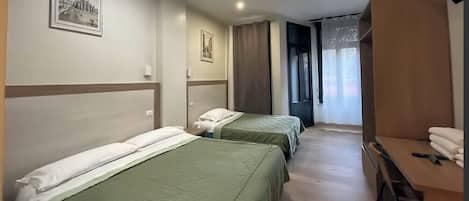 Economy Triple Room | Iron/ironing board, free WiFi