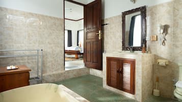 Panoramic Villa, 1 King Bed, Mountain View | Bathroom | Separate tub and shower, rainfall showerhead, slippers, towels