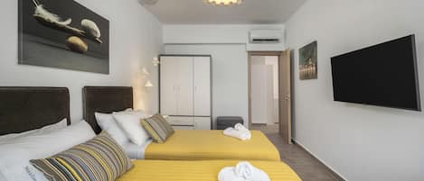 2 عدّة غرف نوم وتجهيزات عازلة للصوت ومكواة/لوح كي وواي فاي مجانًا