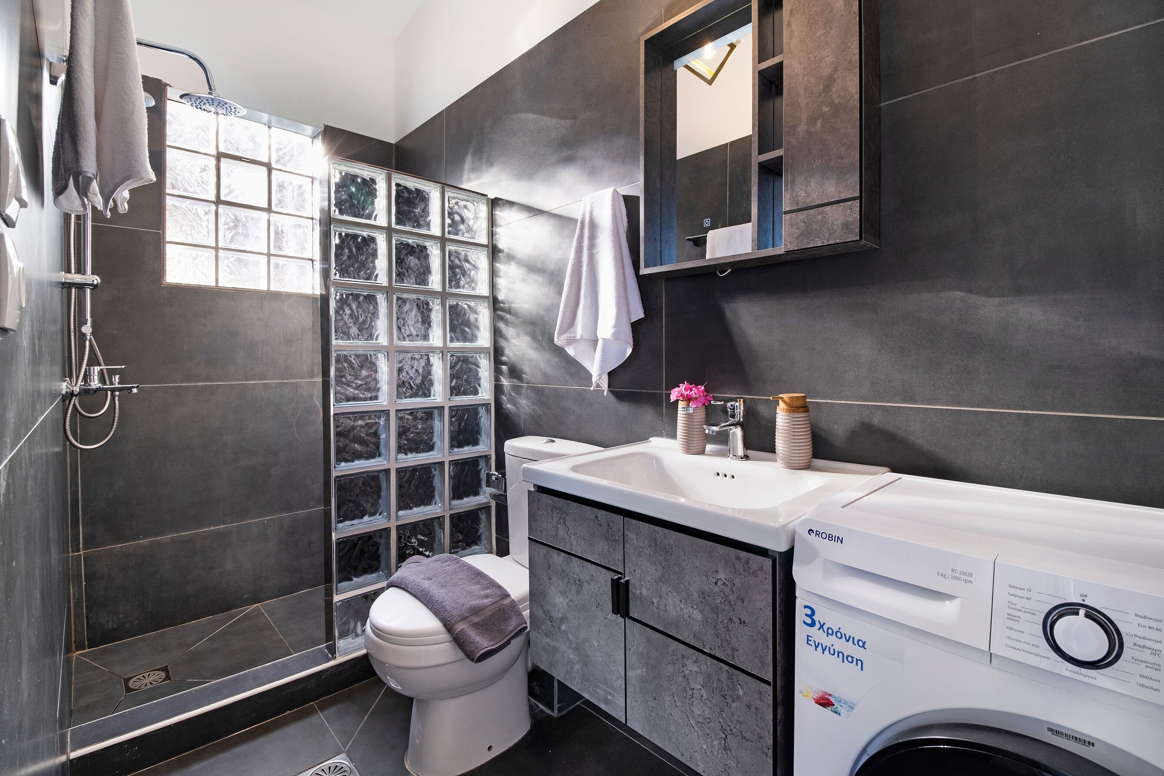 Bathtub, hair dryer, towels