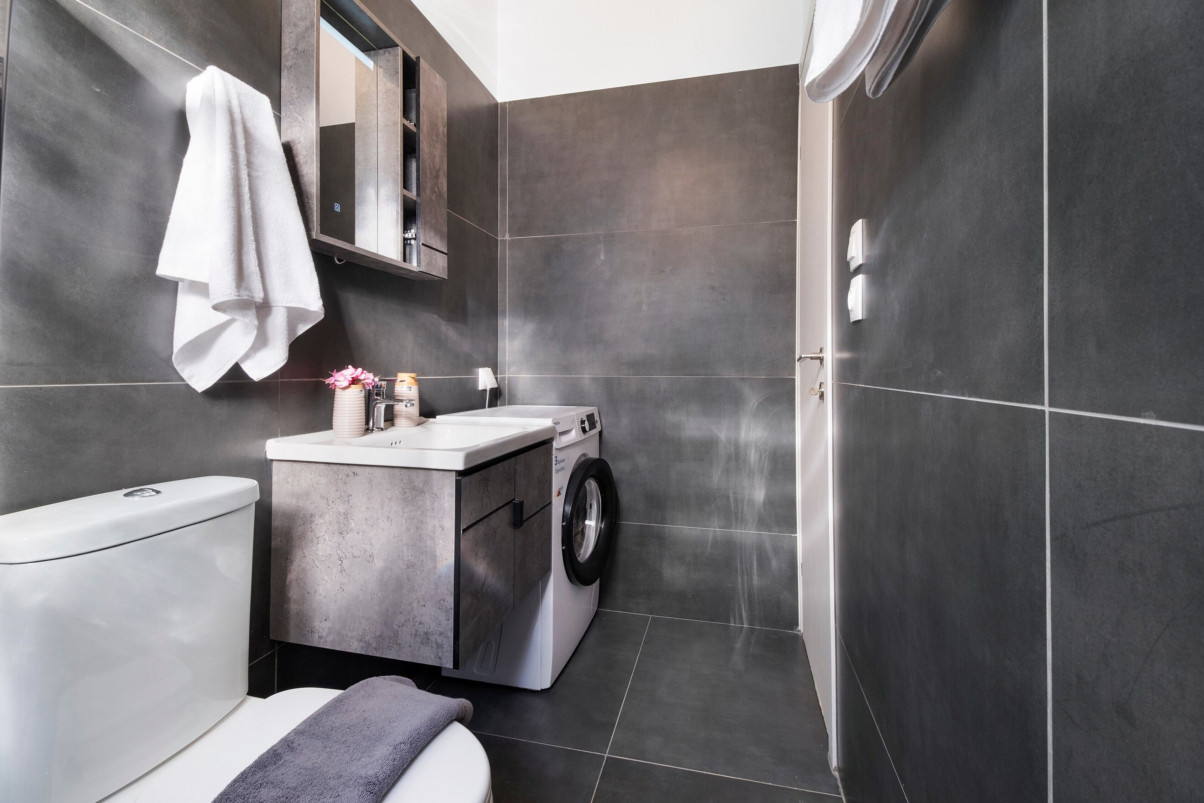 Bathtub, hair dryer, towels