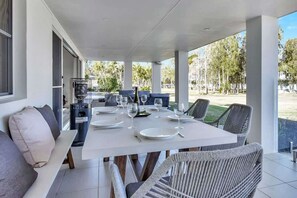 Outdoor dining - Lake Palm Resort Luxury Waterfront on 3 acres (Dora Creek)