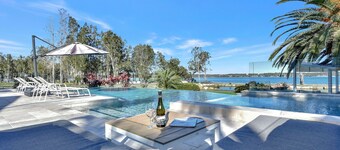 Lake Palm Resort Luxury Retreat absolute Waterfront on 3 acres at Lake Macquarie.