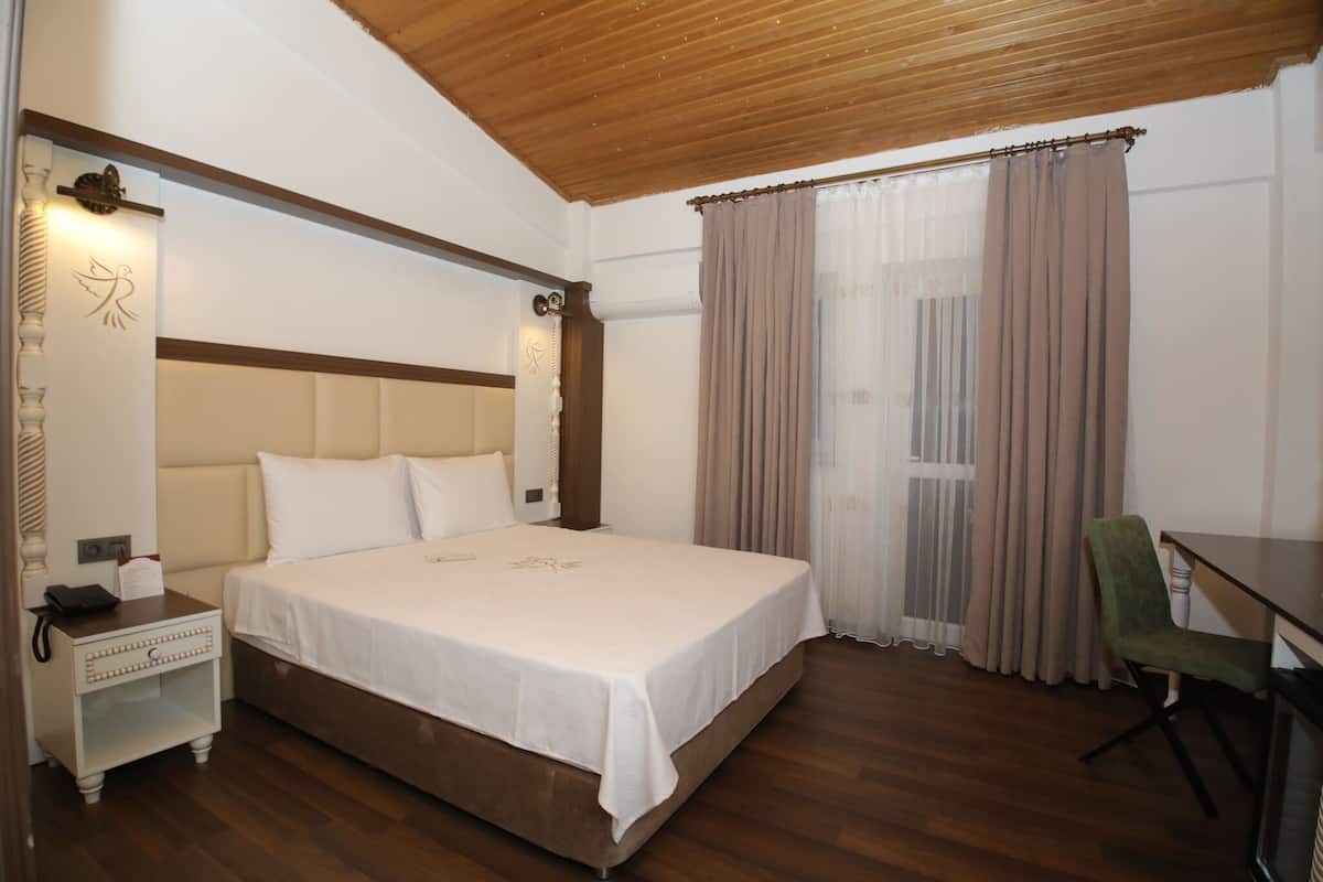 In-room safe, desk, laptop workspace, blackout curtains