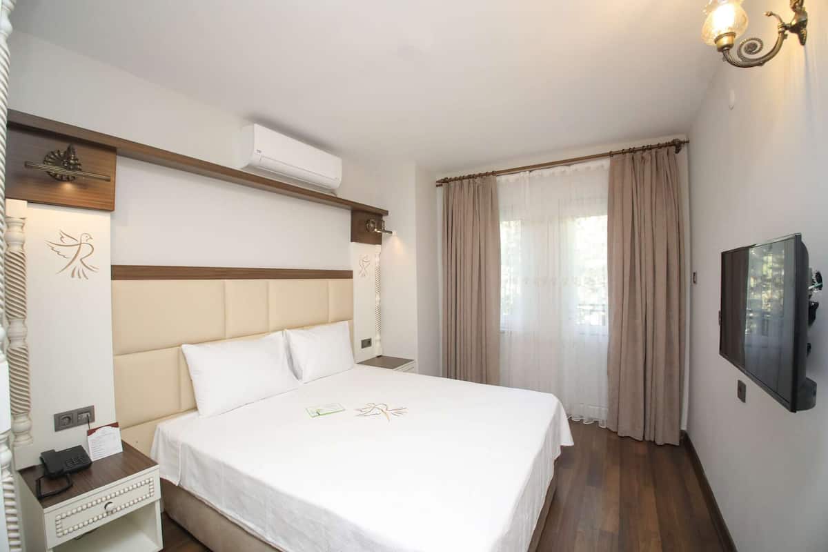In-room safe, desk, laptop workspace, blackout curtains