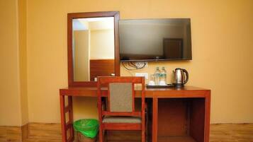 Premium bedding, in-room safe, laptop workspace, soundproofing