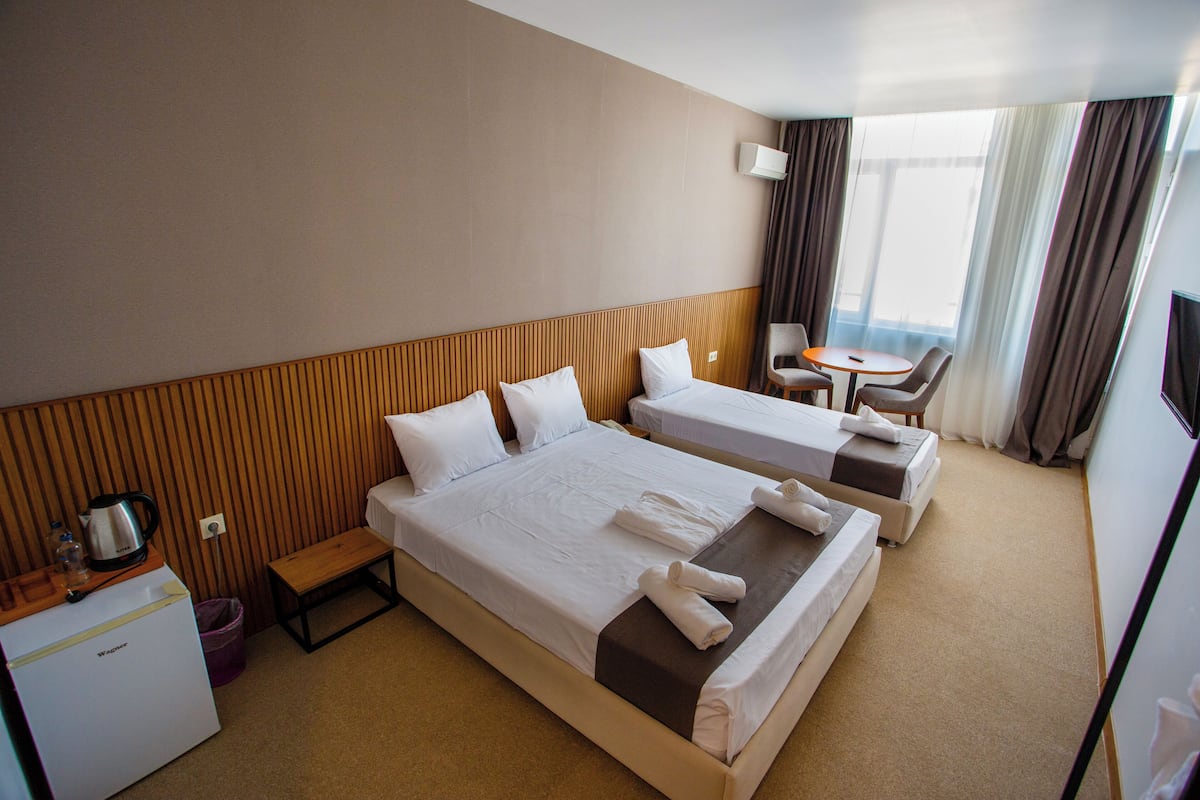 Superior Triple Room | 1 bedroom, Select Comfort beds, minibar, iron/ironing board