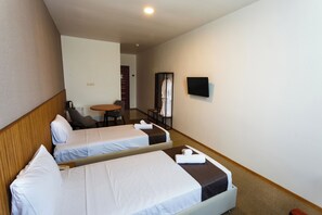 Chambre Supérieure avec lits jumeaux | Matelas Select Comfort, minibar, fer et planche à repasser