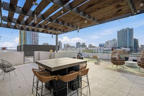 Outdoor dining - Modern Downtown Retreat | Balcony + Rooftop Views (San Diego)
