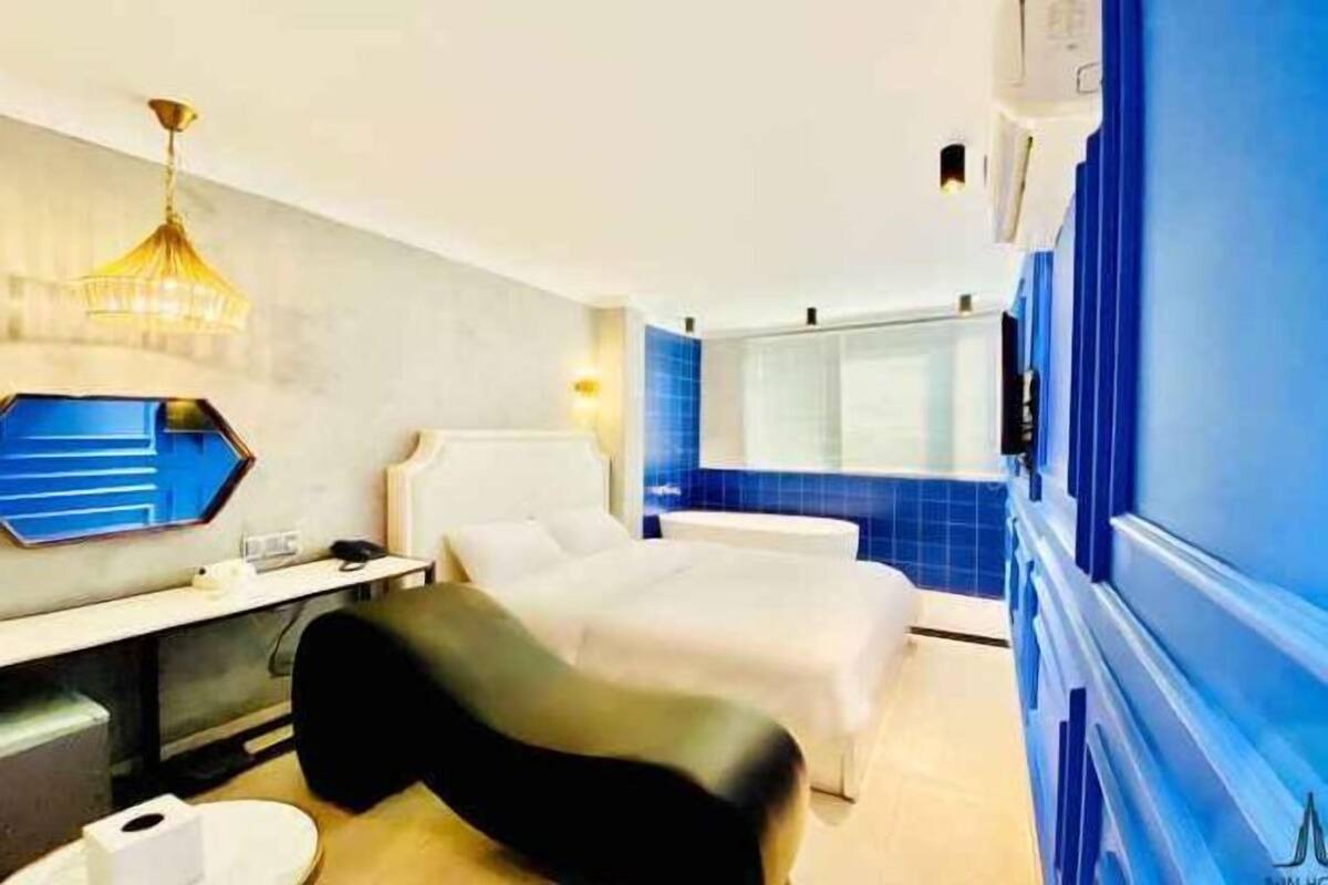 Desk, laptop workspace, blackout curtains, free WiFi