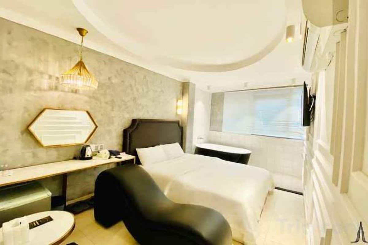 Desk, laptop workspace, blackout curtains, free WiFi