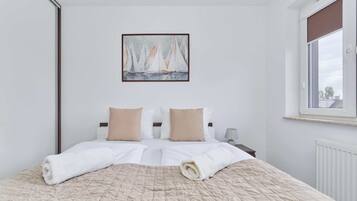 2 bedrooms, desk, iron/ironing board, travel cot