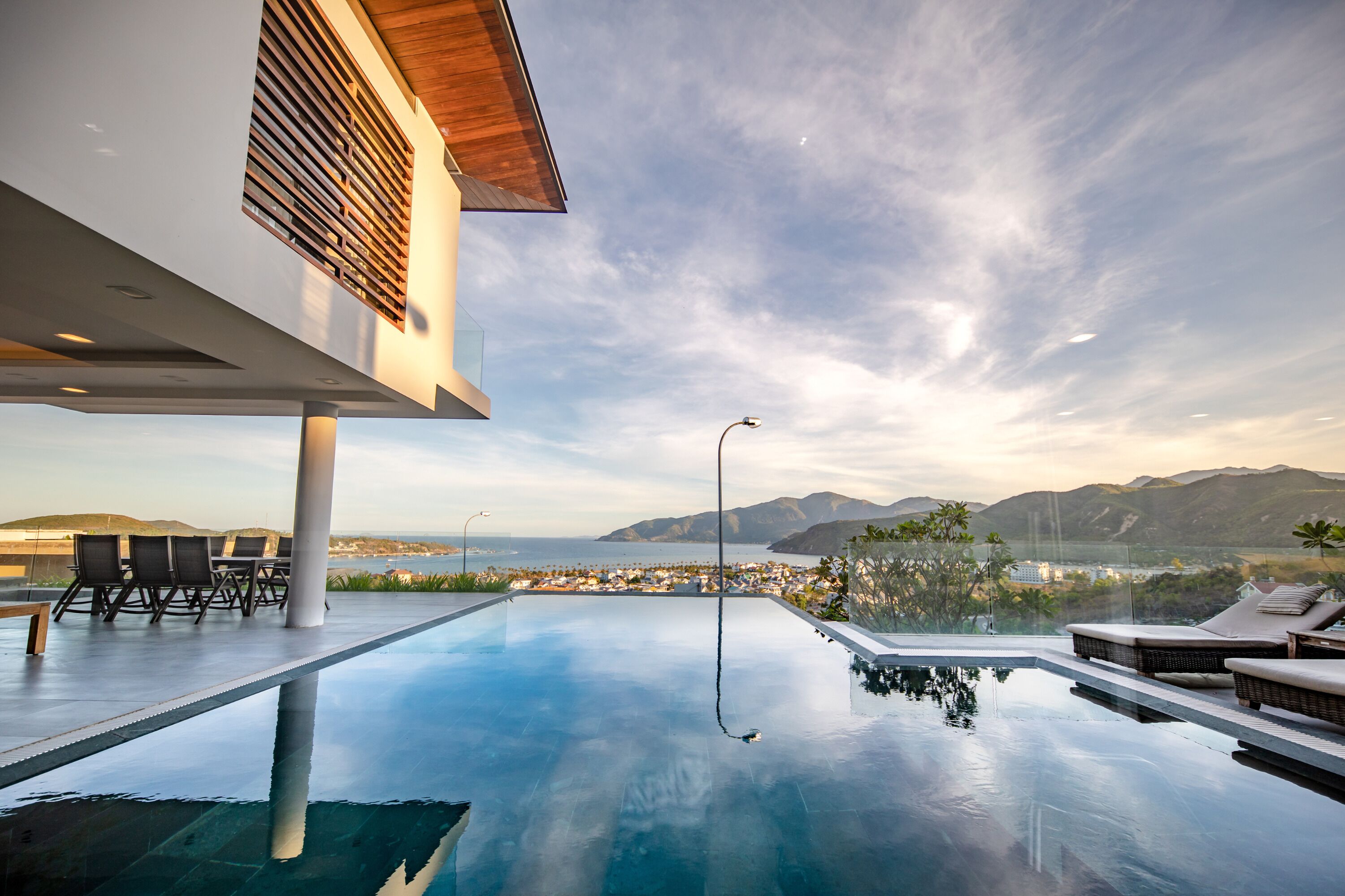 Outdoor pool, a heated pool, open open 24 hours a day, pool umbrellas