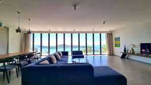 Premium Villa, 4 Bedrooms, Beach View | Living area | Flat-screen TV, fireplace, heated floors - The Ocean Front Villa Nha Trang Abogo (Nha Trang)